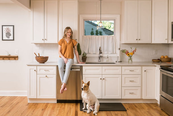 nutritionist Asheville in kitchen with dog